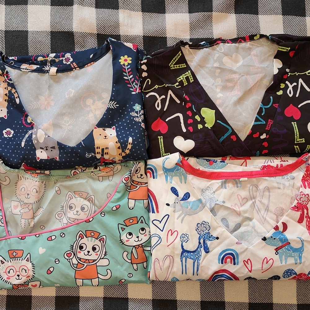 4 Scrub tops with different designs and colours